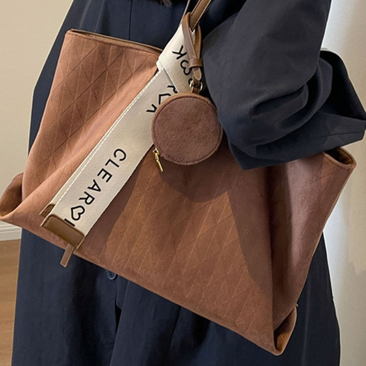 Everyday tote shoulder bag styled for casual travel and errands