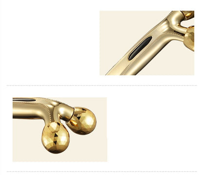 Gold faucet on a beige background