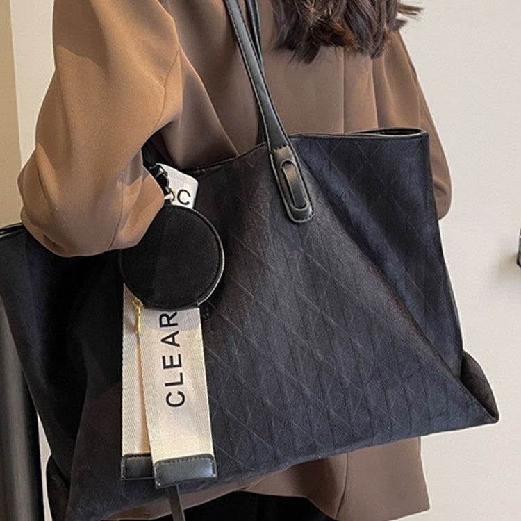 Interior zipper pocket of large capacity tote bag for organization