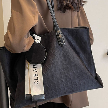 Interior zipper pocket of large capacity tote bag for organization