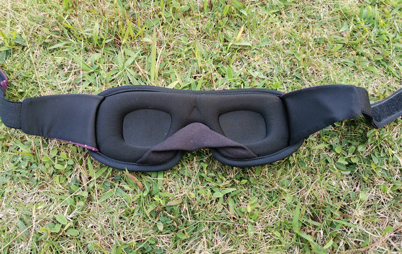 Contoured sleep eye mask designed for comfortable nighttime wear