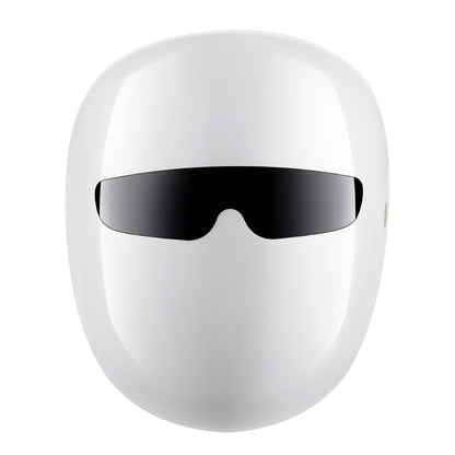 Close-up of LED facial mask device with light settings active