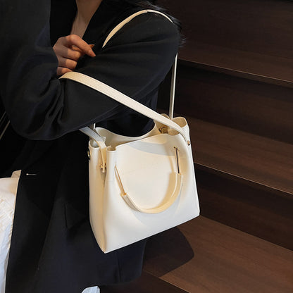 White minimalist bucket bag with clean all-match design