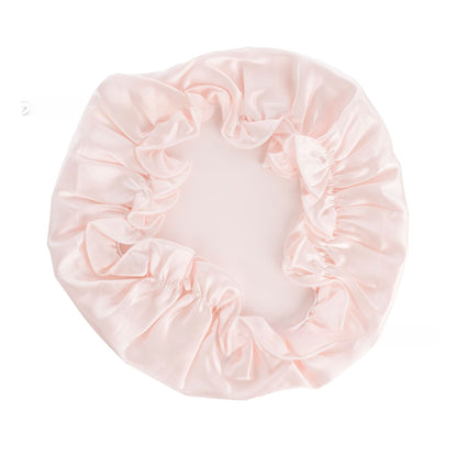 Flat top smooth satin sleeping bonnet with soft lightweight construction and brimless design