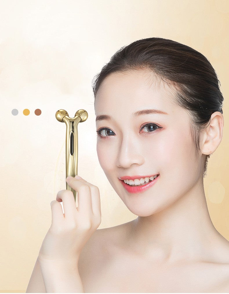 Facial massage beauty tool on bathroom counter