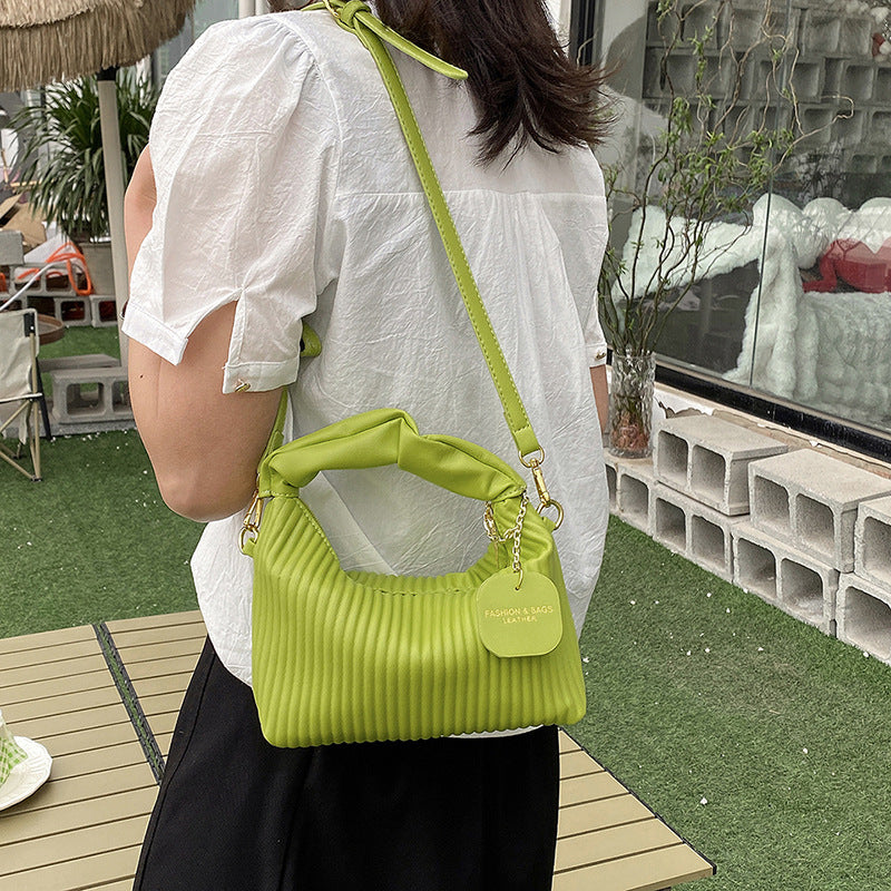 Green pleated women’s crossbody bag for modern daily wear