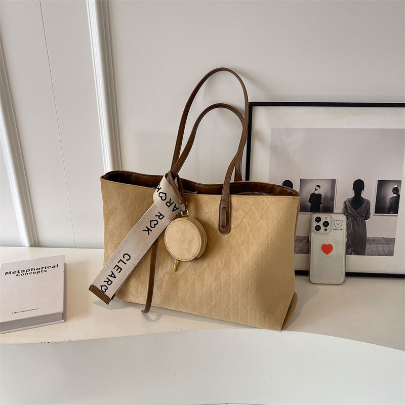 Everyday tote shoulder bag styled for casual travel and errands