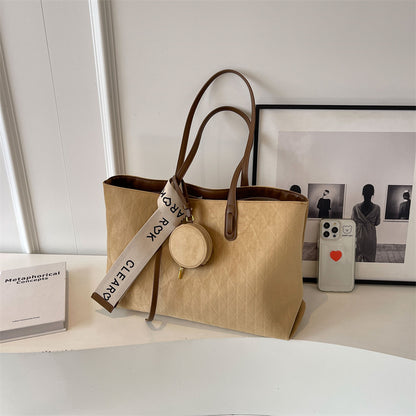 Everyday tote shoulder bag styled for casual travel and errands