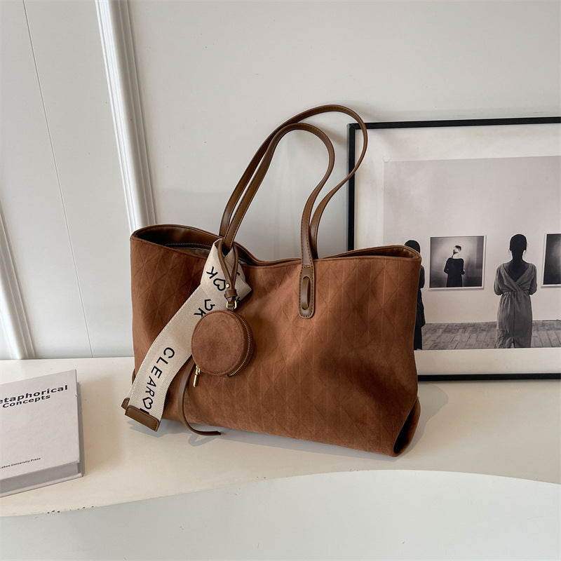 Everyday tote shoulder bag styled for casual travel and errands