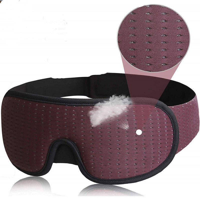 Travel-friendly sleep mask with contoured eye space