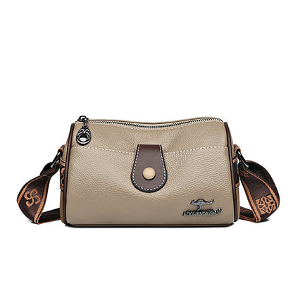 Leather crossbody bag worn as shoulder bag for daily use”