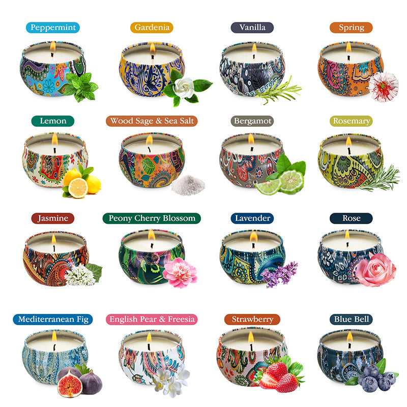 Dried floral soy candles displayed on table