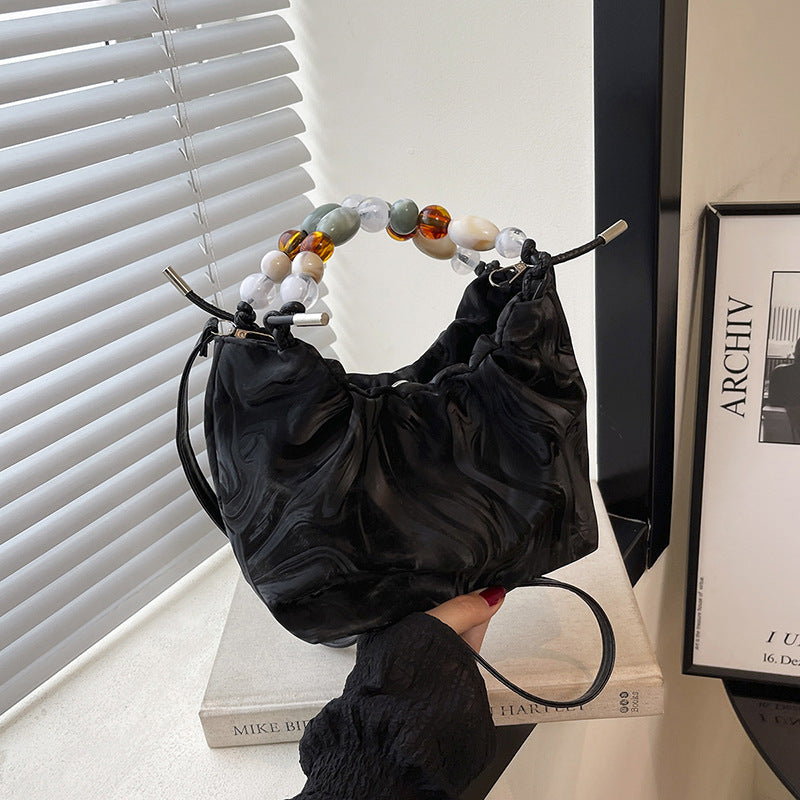 Women’s pleated minimalist pearl crossbody bag with square shape for everyday elegance