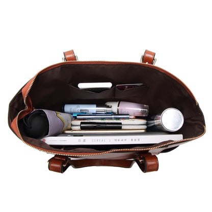 Organized interior of large capacity tote handbag with zipper pockets