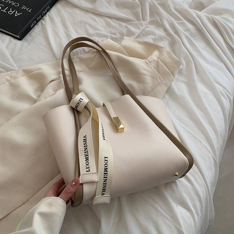 PU leather commuter shoulder bag with soft structured shape