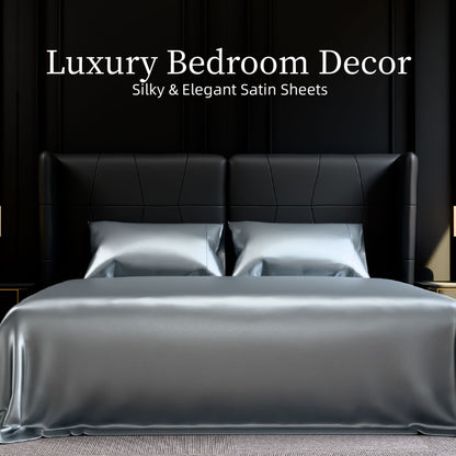 Modern bedroom styled with grey satin king sheets